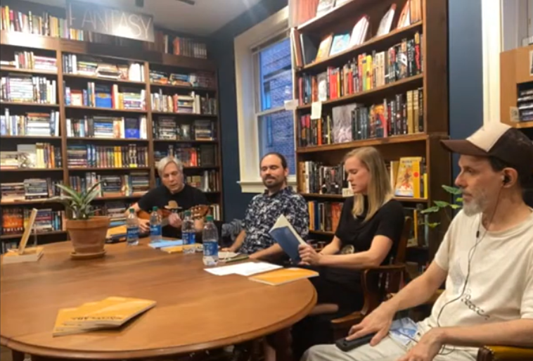 Mark, Keith, Dana, and Martin conducting a live reading and conversation at Lost City Books.